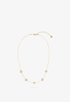 Collier chaîne en or avec cinq motifs floraux ornés de petites pierres claires. Longueur ajustable avec une fermeture à mousqueton et des maillons supplémentaires.