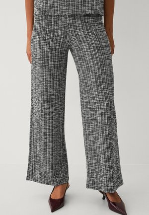 MIT BOUCLÉ-STRUKTUR - Broek - schwarzweiß