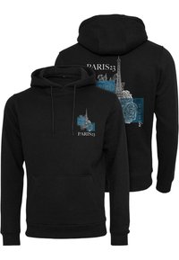 Black hoodie with a front pocket, featuring an Eiffel Tower graphic, floral accents, and the text "PARIS23" in white and blue.