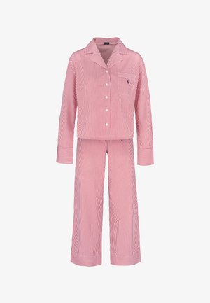 Conjunto de pijama de rayas rojas y blancas hecho de tela suave, con una camiseta de botones y un bolsillo, y pantalones holgados con puños en los bajos.