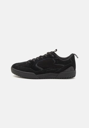Black athletic shoes featuring a suede and mesh upper, thin laces, and a textured rubber sole with a moderate profile.
