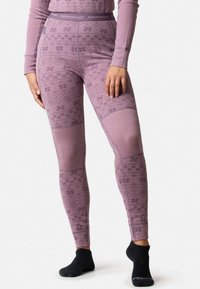 Leggings viola a motivo con vita alta, caratterizzati da un design testurizzato di fiocchi di neve e diamanti. Realizzati in tessuto elastico per il massimo comfort.