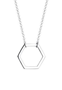 Sølv geometrisk halskæde med en hexagonal vedhæng med hul i midten, fastgjort til en kæde med led. Enkel og moderne design.