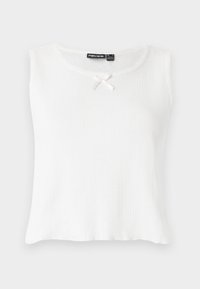 Top bianco senza maniche con una textura a coste, scollatura rotonda e un piccolo fiocco color crema come accento al colletto. Design semplice e non decorato.