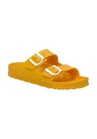 Yellow plastic slide sandal with two adjustable white buckles, open toe design, and textured sole for grip. Lightweight and flexible.