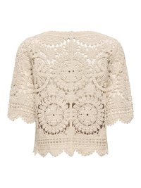 Haut beige en dentelle crochet à manches courtes avec des motifs floraux circulaires complexes et des bords festonnés, vu de dos.