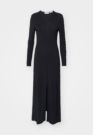 Schwarzes langärmliges Kleid aus weichem Stoff, mit rundem Ausschnitt und einem Schlitz vorne. Sleek, taillierte Silhouette mit minimalistischem Design.