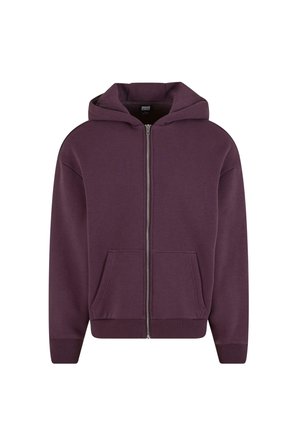 Lila zip-up hoodie tillverkad av ett mjukt tyg, med en rymlig huva, två framfickor samt ribbnade ärmslut och nederkant.
