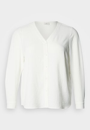 White, long-sleeve button-up shirt with a V-neck. Features a textured fabric and a straight cut, with visible front buttons and cuffs.