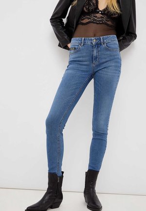 Vaqueros pitillo - blue denim