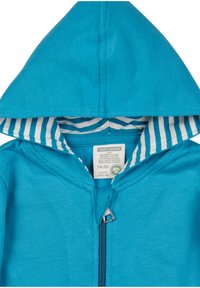 Felpa con zip turchese con cappuccio foderato, caratterizzata da strisce bianche e blu; realizzata in cotone organico; taglie indicate sull'etichetta.