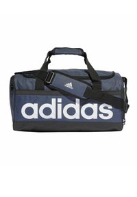 Borsa da viaggio Adidas in blu navy con logo bianco, dotata di manici doppi e spallacci regolabili. Tessuto resistente con un design elegante.