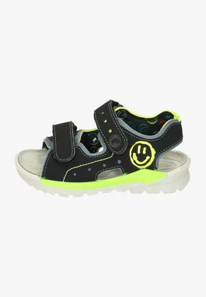Zwarte sandaal met twee verstelbare banden, neongele accenten en een smiley-gezichtdetail. Heeft een gestructureerde zool en een ademend ontwerp.