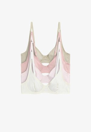 Tres sujetadores de copa blanda en beige, rosa empolvado y blanco con tirantes finos ajustables, apilados verticalmente sobre un fondo blanco.