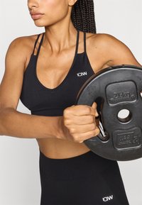 ICANIWILL DEFINE SEAMLESS V SHAPE BRA - Sports-BH-er med medium støtte - black