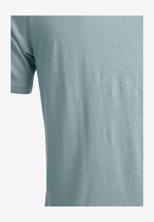 Helles blaues T-Shirt mit kurzen Ärmeln aus weichem, glattem Stoff. Einfaches Design mit Rundhalsausschnitt und ohne sichtbare Muster oder Akzente.