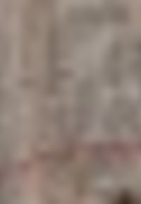 Surface texturée floue rose et grise avec un motif abstrait. Le matériau semble doux avec des dégradés subtils et des variations de couleur.