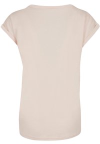Short-sleeve, light pink T-shirt with a round neckline and a smooth texture, featuring rolled cuffs and a straight hem.
