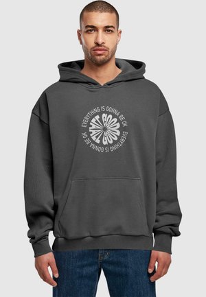 Dark gray hooded sweatshirt with a front pocket, featuring white text in a circular pattern stating "Everything is gonna be OK."