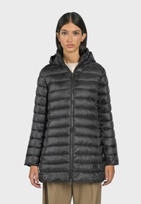 Black puffer jacket with a hood, featuring a zip front, quilted design, and a slightly shiny finish. It has long sleeves and side pockets.