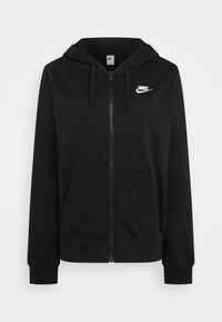 Svart zip-up hoodie i bomullsmaterial. Har en framficka, dragsko på huvan och en vit Nike-logotyp på vänster bröst.