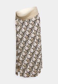 Saia com padrão floral e um cós elástico bege. Apresenta folhas pretas, brancas e cremes sobre um fundo claro, com um design esvoaçante.