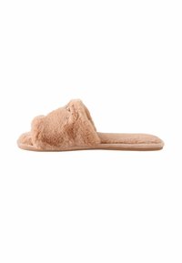 Fuzzy beige slide tofflor med en mjuk textur, öppen tå-design och en dämpad sula, med en plyschöverdel och minimalistisk sömnad.
