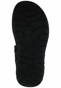 Schwarze Gummisohle mit tiefen Profilen, die eine strukturierte Oberfläche und die Marke "Dockers®" zeigt. Verfügt über ausgeprägte Griffmuster und glatte Kanten.