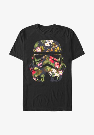 Černé bavlněné tričko s designem helmy stormtroopera vyplněné živými tropickými květinami a zelenými listy.