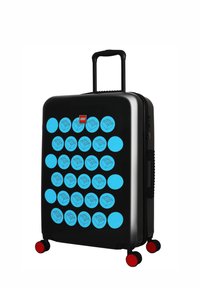 Black suitcase with blue circular LEGO designs, hard shell, retractable handle, and red wheels for mobility. Compact and durable design.