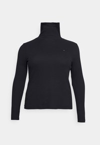 Sort turtleneck top lavet af glat stof, lange ærmer og høj krave. Har subtilt brandlogo på brystet.