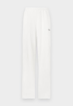 Valged, ribadest lounge-püksid elastse vöökohtadega ja väikese dekoratiivse logoga vasakul küljel. Sirge jala disain ja pehme tekstuur.