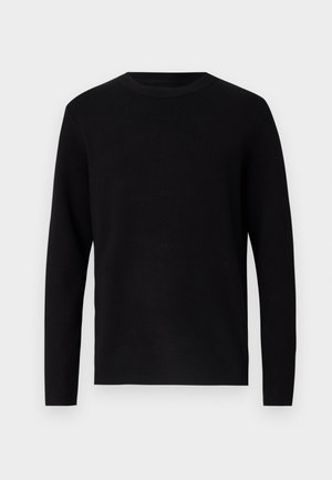 Maglione nero a maglia con scollatura rotonda e maniche lunghe. Tessuto liscio e colore uniforme, privo di motivi o dettagli visibili.