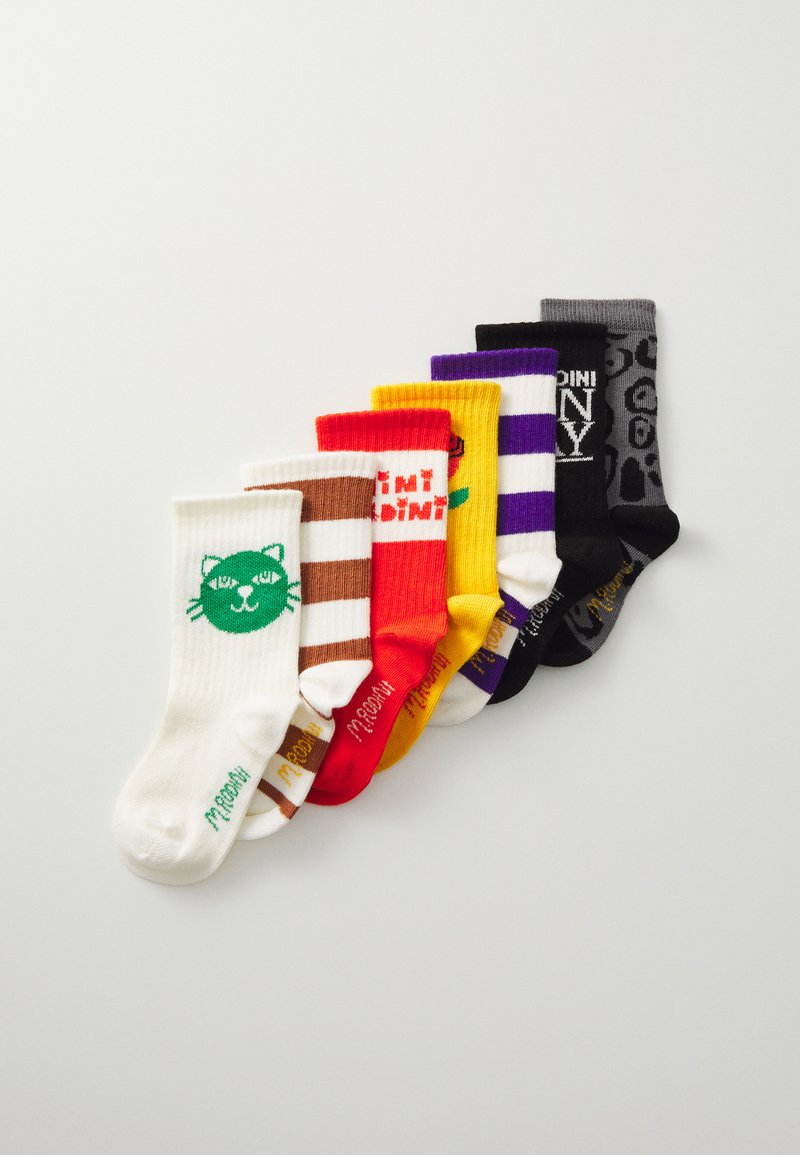 Colorful socks collection featuring varied patterns: a white cat design, stripes, a rose, and animal print. Made from a soft fabric.