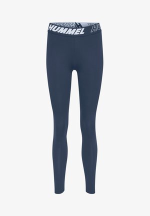 Marine leggings lavet af strækbart stof, med en hvid talje med "HUMMEL" logo, designet til komfort og fleksibilitet.