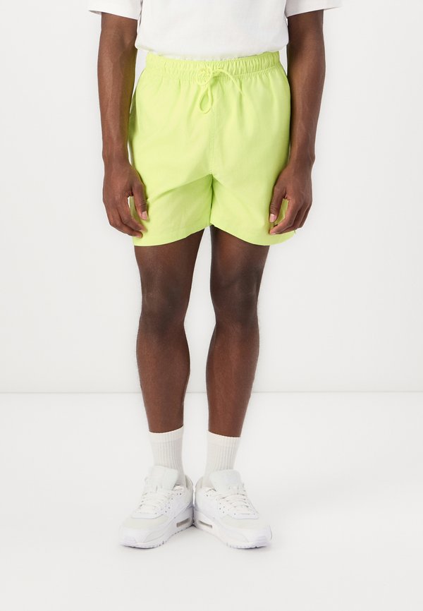 CLUB FLOW - Tracksuit bottoms - lemon twist