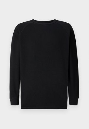 Black long-sleeve shirt with a textured, waffle knit design. Features a round neckline and ribbed cuffs. No visible logos or patterns.
