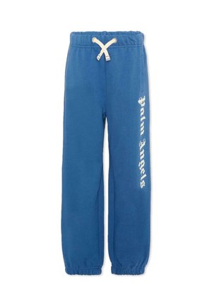 Pantaloni della tuta blu con vita e polsini elasticizzati, coulisse bianca e scritta "Palm Angels" stampata verticalmente in bianco sulla gamba destra.