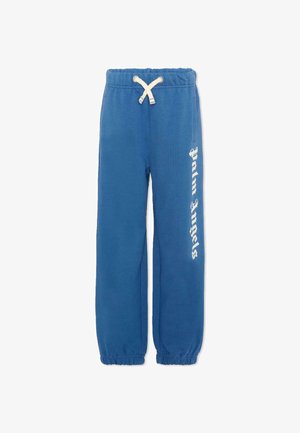 Pantaloni della tuta blu con vita e polsini elasticizzati, coulisse bianca e scritta "Palm Angels" stampata verticalmente in bianco sulla gamba destra.