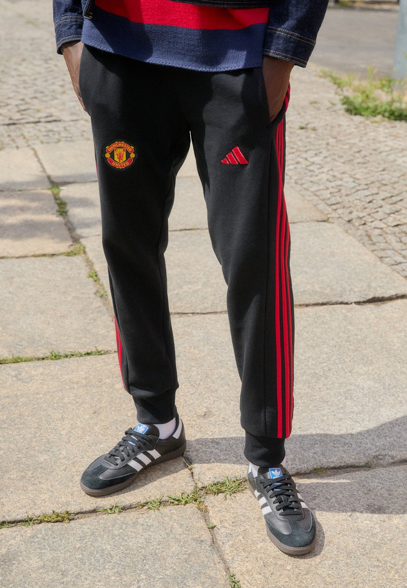 adidas Performance - MANCHESTER UNITED PANT - Teplákové kalhoty - black, Zvětšit