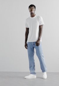 sandro CROSS - Camiseta básica - white