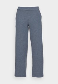 Calças de malha azul, suaves, com um design de perna reta, cintura elástica e sem fechos visíveis. A textura parece lisa e uniforme.