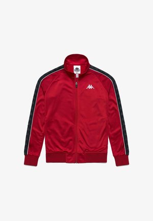 Giacca da track in poliestere rossa con pannelli laterali a strisce nere e bianche, chiusura con cerniera, collo alto e logo Kappa sul petto.