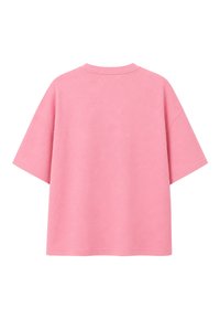 T-shirt oversize rose uni à manches courtes, vu de dos avec un col rond sur fond blanc.