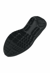 Semelle de chaussure en caoutchouc noir présentant divers motifs texturés, y compris des bosses surélevées et des rainures pour l'adhérence, avec un bord lisse et un talon arrondi.