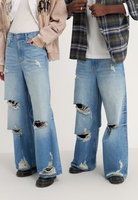 YOURTURN by Zalando UNISEX - Loose Jeans - light blue denim