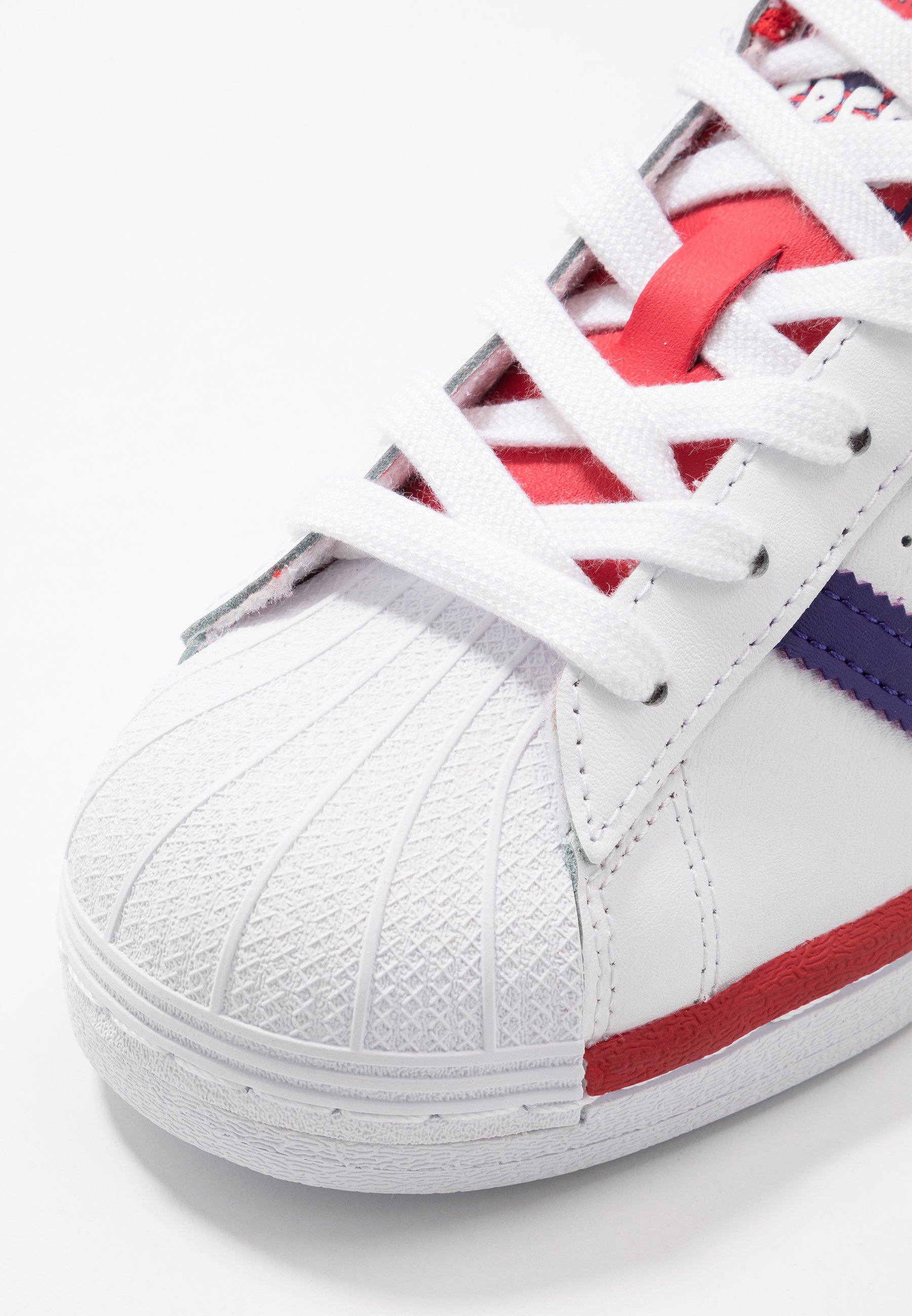 adidas superstar slip on Violet homme