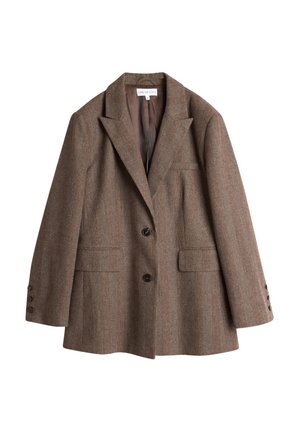 Brun rutete blazer med notklipper, en-knappslukking og to frontlommer. Har en glatt innerfôr og dekorative knapper på ermene.