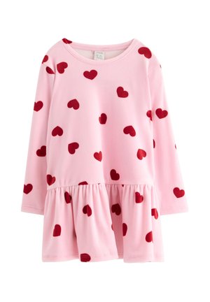 Pink long-sleeve dress with a ruffled hem, decorated with scattered red heart shapes all over the fabric.