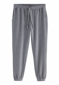 Pantaloni da tuta grigi a coste con vita regolabile tramite cordino, polsini elasticizzati e tasche laterali. Il tessuto ha una finitura morbida e testurizzata.